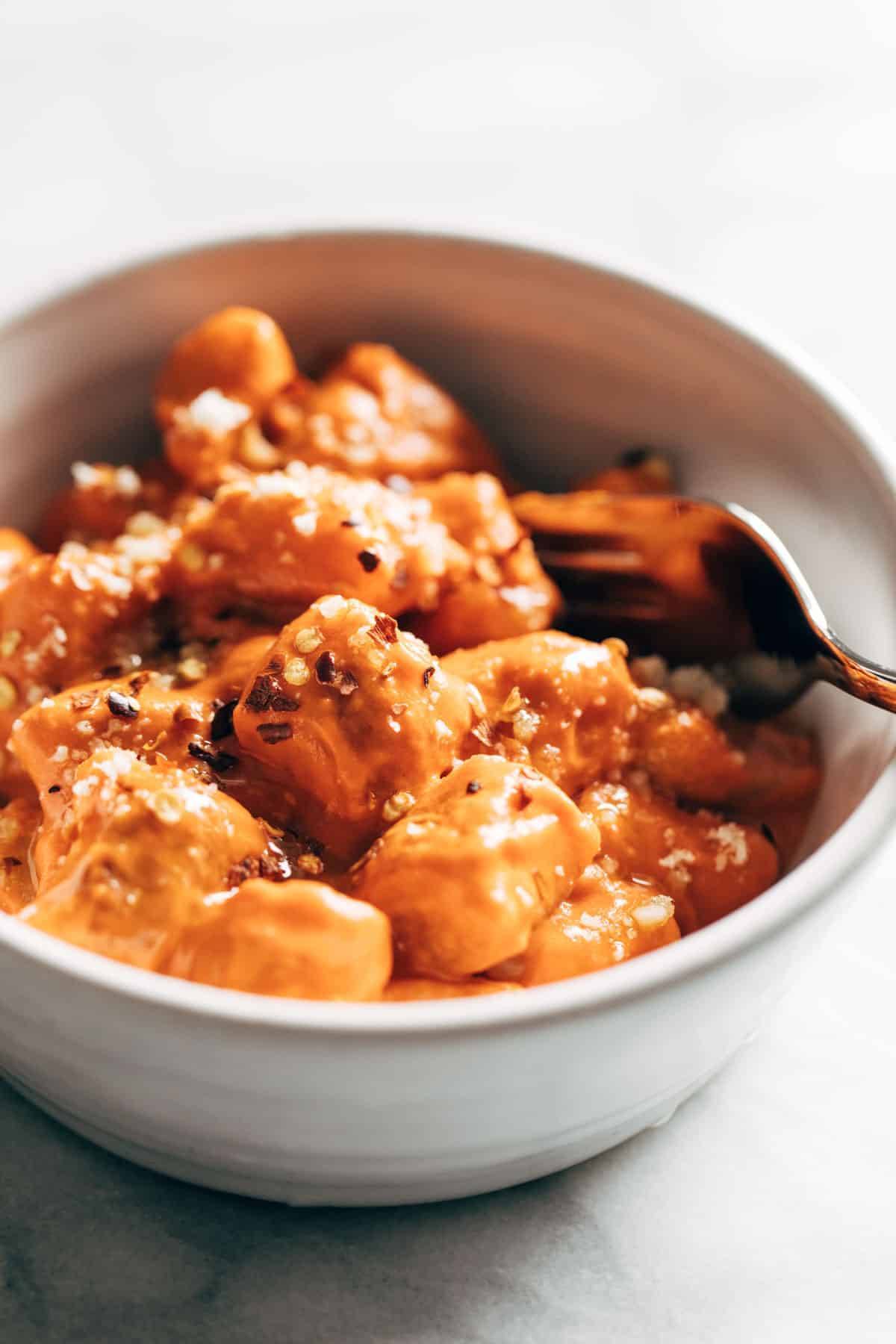 Cauliflower gnocchi with vodka sauce in a bowl.