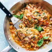 Garlic Basil Barramundi in a skillet with spatula.