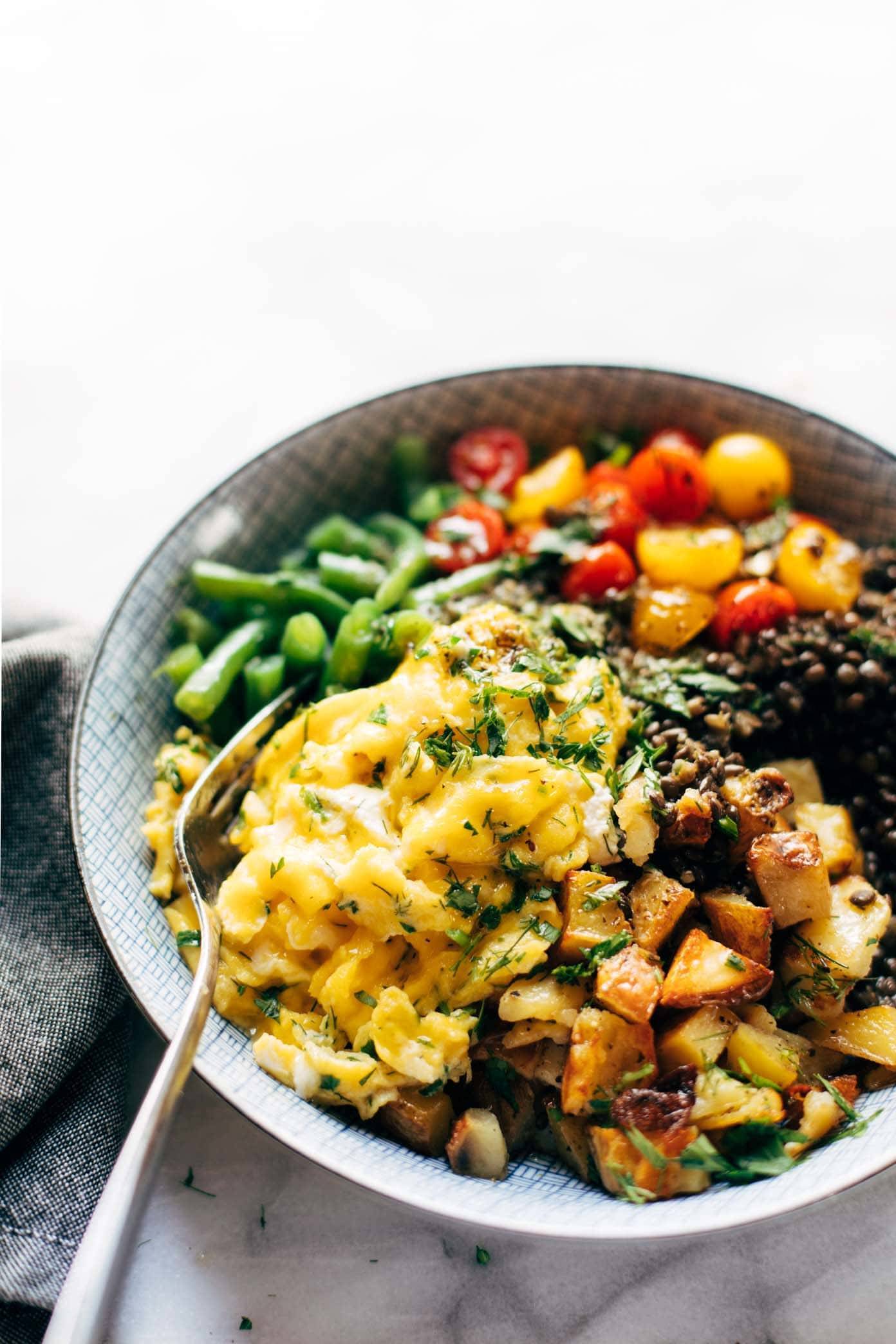 Sunshine Lentil Bowl with a fork.