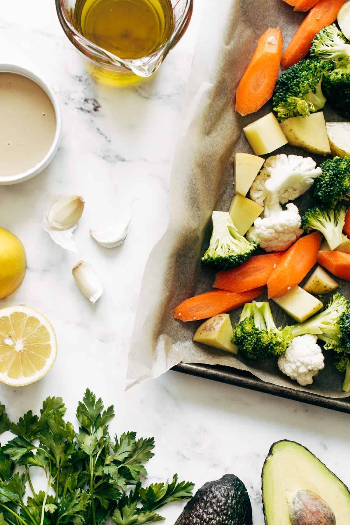 Veggies on a pan ready for roasting.