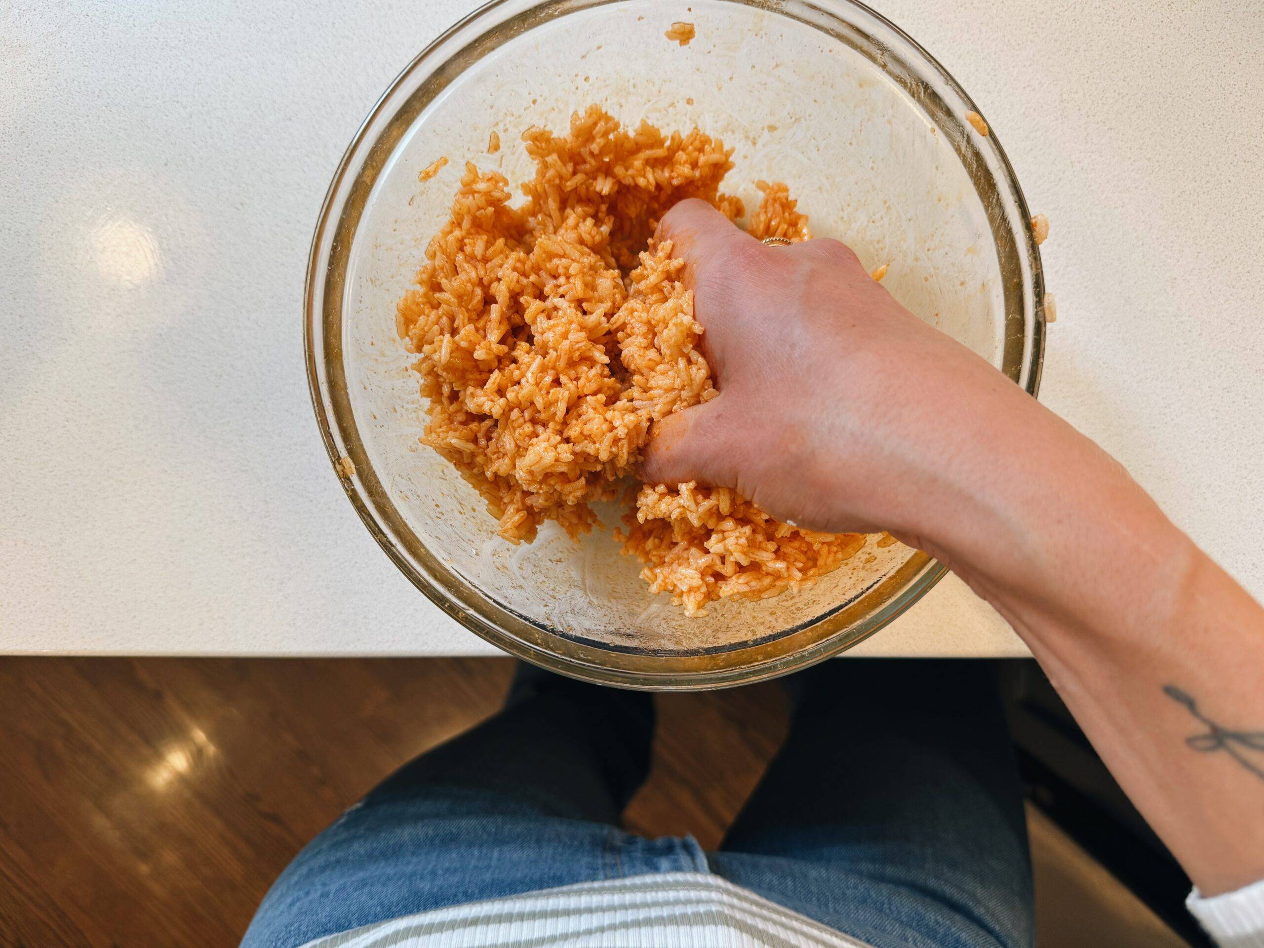 Red curry rice in a bowl.